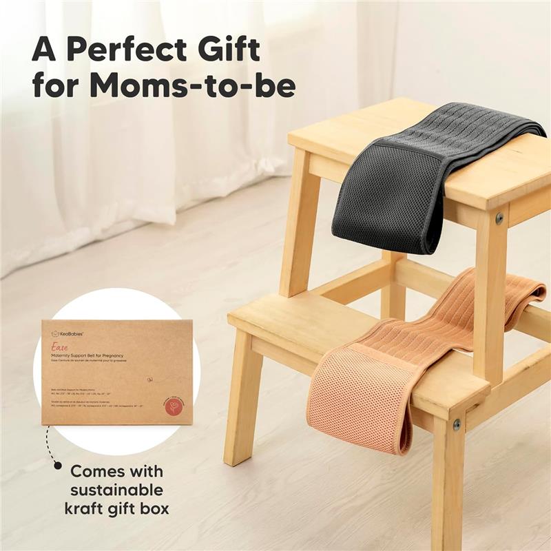 Maternity belly bands in beige and black on a wooden stool, with a kraft gift box labeled for pregnancy support.