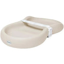 Silicone diaper changing pad in vanilla beige with a safety strap for secure use.