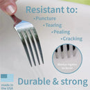 Silicone diaper pad with a fork demonstrating resistance to punctures, tearing, pealing, and cracking. Text highlights durability.