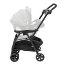 Chicco Keyfit Caddy Frame Stroller in black, designed to hold a compatible infant car seat, featuring a mesh storage basket.