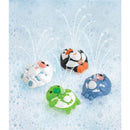 Assorted squirt toys including a polar bear, penguin, turtle, and seal, spraying water in bubbly blue water.