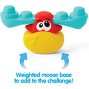 Wobbly Stacking Moose toy featuring a red moose head atop a yellow base with blue stacking pieces, labeled for added challenge.