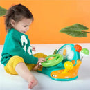 Child playing with Bright Starts Lights & Colors Driver Toy Steering Wheel featuring interactive buttons and colorful design.