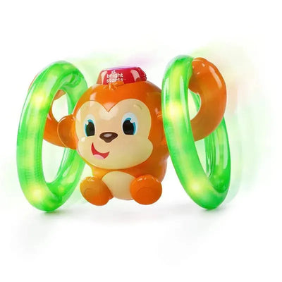 Crawling baby toy featuring a smiling orange monkey with glowing green rings, designed to encourage movement and play.