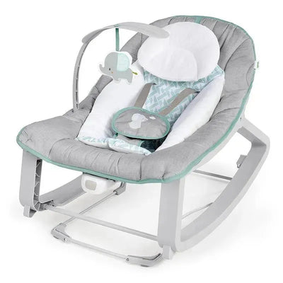 Vibrating baby bouncer in gray and mint, featuring an elephant toy and a plush head support for comfort.