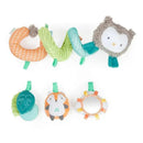 Colorful plush toys forming a spiral bar, featuring an owl, a fox, a mirror, and various textures for sensory play.