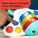 Colorful Kids II Pop ‘N’ Explore Stingray Popper Toy with buttons for lights and music, featuring popper action.
