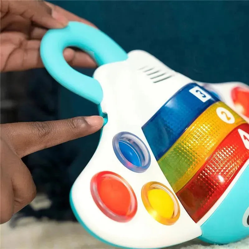 Colorful Kids II Pop ‘N’ Explore Stingray Popper Toy with buttons and lights, designed for interactive play.