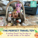 Activity toy featuring Lilo and Stitch’s Angel, hanging above a smiling baby in a car seat, with teether rings attached.