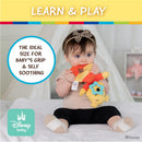 Disney Baby Winnie The Pooh sensory blanky featuring crinkle and teether, held by a baby engaging in play.