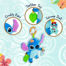 Disney Stitch On The Go Activity Toy featuring a blue Stitch plush, crinkly ears, a teether leaf, and a Scrump doll.