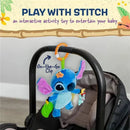 Interactive Disney Stitch toy with a clip for attaching to strollers, features bright colors and soft textures.