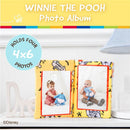 Disney Winnie the Pooh photo album featuring soft crinkle pages, holds four 4x6 photos, with images of children and Eeyore plush.