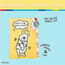 Disney Winnie the Pooh photo album featuring soft crinkle pages, a travel clip, and playful illustrations.