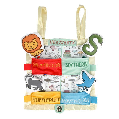 Soft fabric activity toy featuring Harry Potter Hogwarts houses, with Gryffindor, Slytherin, Hufflepuff, and Ravenclaw details.