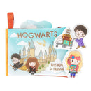 Soft fabric book featuring a Hogwarts scene with characters, toys, teether, and crinkly textures for infants.