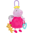 Peppa Pig activity toy with fairy wings, wearing a crown, holding a yellow toy dog and a blue heart-shaped ring.