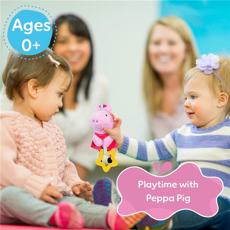 Girls play with the Kids Preferred Peppa Pig Take Along Activity Toy, suitable for ages 0+, in a bright setting.