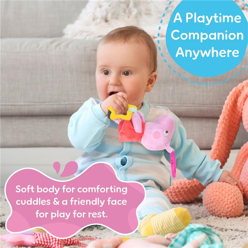 Baby playing with the Kids Preferred Peppa Pig toy, featuring soft, cuddly textures and bright colors for comfort and fun.