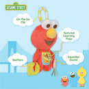 Elmo activity toy featuring textured learning flaps, teething rings, and a squeaker sound, with an on-the-go clip.