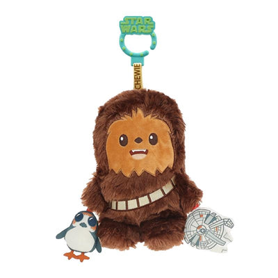 Cute plush Chewbacca toy with an attached clip, featuring a smiling face and holding a mini penguin and Millennium Falcon.