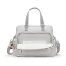 Kipling Alanna Baby Bag in Cool Fog color, featuring a front zipper pocket and a plush animal keychain.