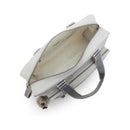 Kipling Alanna Baby Bag in Cool Fog, featuring a spacious interior with a zipper and a decorative keychain charm.