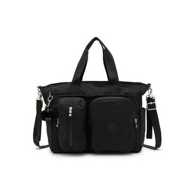Convertible diaper backpack in Tiny Black Noir, featuring multiple pockets and adjustable straps, ideal for parents on-the-go.