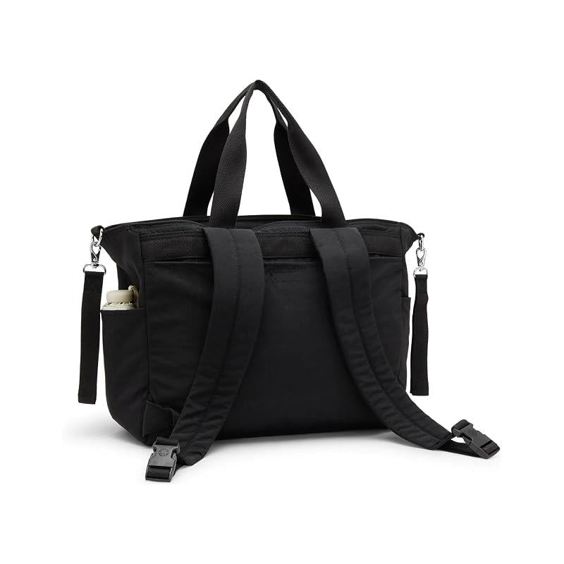Convertible diaper backpack in Tiny Black Noir, featuring sturdy straps, external pockets, and a sleek, minimalist design.
