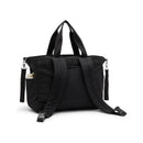 Convertible diaper backpack in Tiny Black Noir, featuring sturdy straps, external pockets, and a sleek, minimalist design.