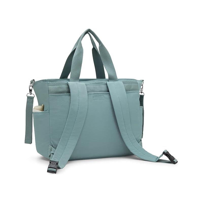 Convertible diaper backpack in tiny green color with adjustable straps and top carry handles.
