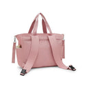 Convertible diaper backpack in Tiny Smoky Blush with multiple compartments and adjustable straps.