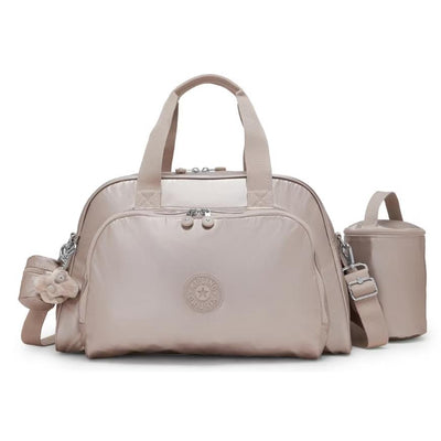 Kipling Camama diaper bag in Tiny Metallic Glow, featuring a light beige color, multiple compartments, and a removable insulated bottle holder.