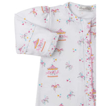 Kissy Kissy Carousel Magic Zip Footie featuring a whimsical print of carousels and unicorns with colorful hearts.