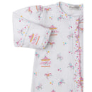 Kissy Kissy Carousel Magic Zip Footie featuring a whimsical print of carousels and unicorns with colorful hearts.