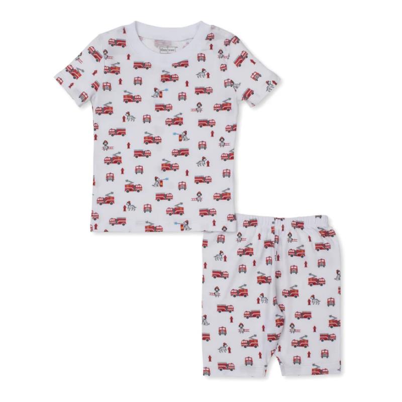 Short-sleeve white pajama set featuring firefighter-themed prints of red fire trucks and characters.
