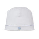 White baby hat with blue hand embroidery featuring a sweet sheep design on the front edge.