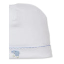 White baby hat featuring hand embroidery of a blue sheep at the base, with a delicate blue stitched trim.