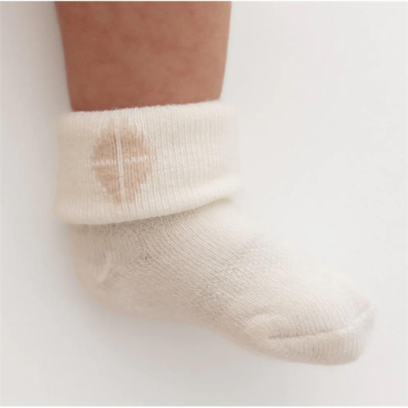 Kyte Baby 3Pk Socks in Cloud, featuring a soft cream color and a cuff with a subtle logo.