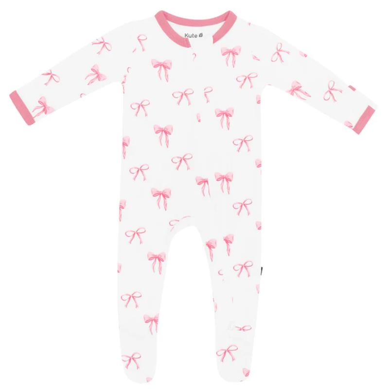 Baby girl zippered footie in white with pink bows, featuring long sleeves and pink trim.
