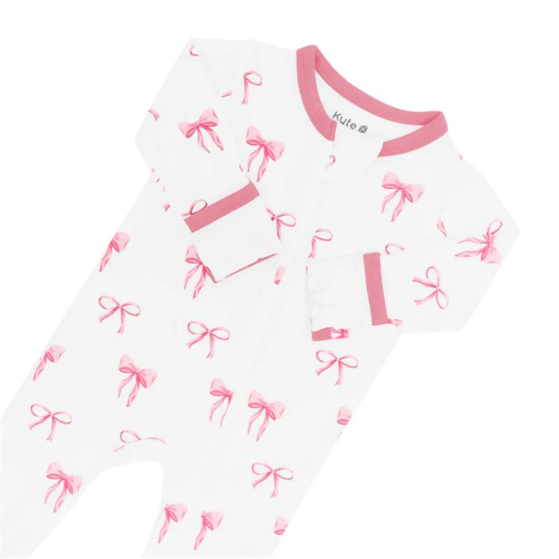 Baby girl zippered footie featuring a white fabric with pink bow prints and pink trim, designed for comfort and style.