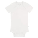 Neutral baby bodysuit in soft cloud color with short sleeves and snap closure at the bottom, by Kyte Baby.
