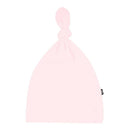 Knotted cap for infants in Sakura Pink, made for ages 0 to 3 months, featuring a soft, single-knot design.