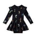 Long sleeve twirl bodysuit dress in black featuring colorful wildflower patterns and ruffled sleeves.