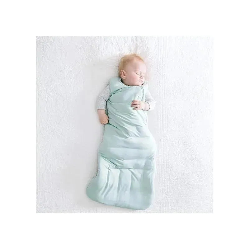 Kyte Baby Original Bamboo Sleep Bag in sage, with a sleeping baby inside, displayed against a white background.