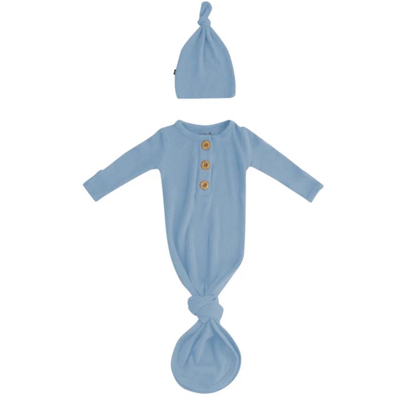 Ribbed slate-colored knotted gown with three wooden buttons and matching knotted hat set for infants.