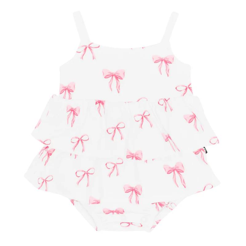 White ruffle romper with spaghetti straps, featuring a pink bow print, designed for infants.