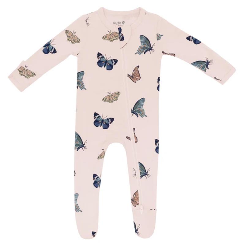 Zippered footie in blush color featuring various butterfly prints, designed for infants by Kyte Baby.