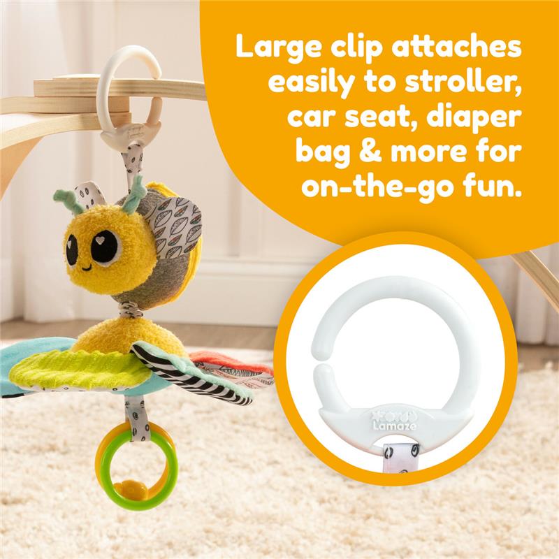 Brightly colored Buzzy the Bee toy with a large clip for easy attachment to strollers and diaper bags for travel fun.