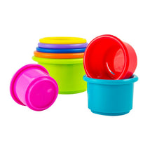 Brightly colored stacking cups from Lamaze, featuring a mix of pink, green, blue, red, orange, and yellow cups for play and learning.